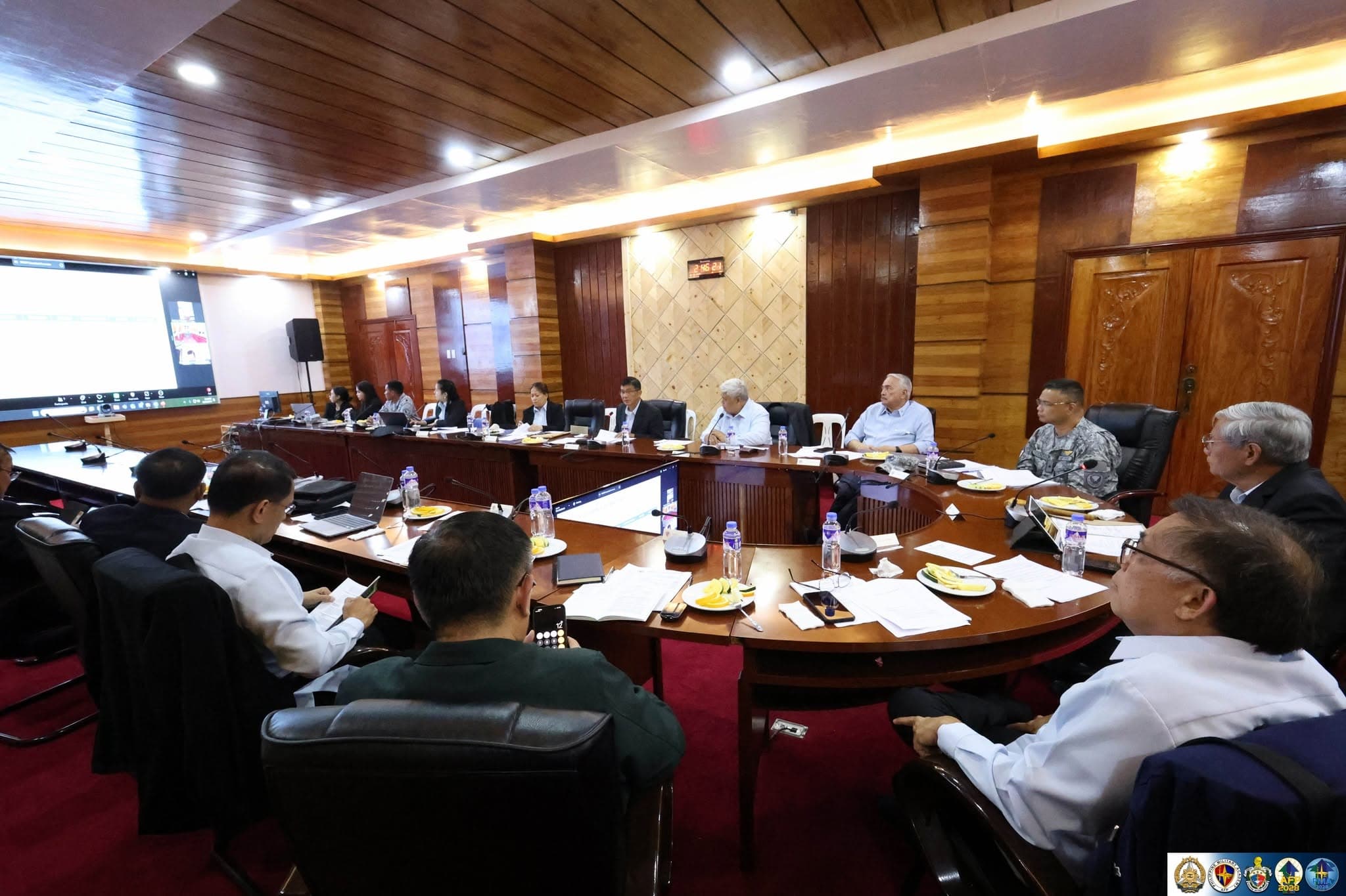 The PMAFI Board of Trustees in session around the boardroom table.